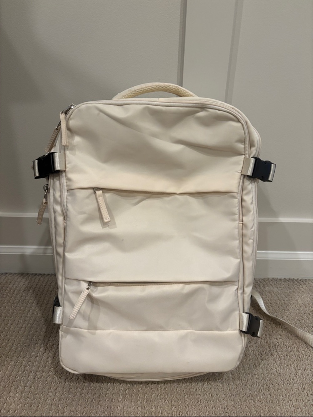 Amazon Cream Backpack with Black Accent Buckles